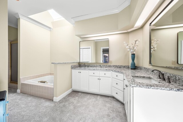 100 Carriage Way, Hendersonville, TN 37075 - bathroom with double vanity, a garden tub, a shower stall, crown molding, and baseboards