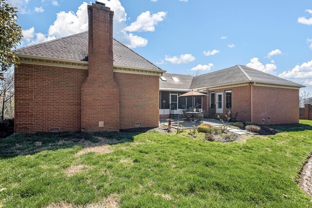 100 Carriage Way, Hendersonville, TN 37075 - rear view of property with brick siding, crawl space, a patio area, a lawn, and a chimney