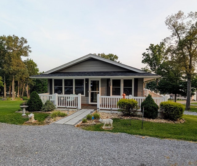 41 Nancy Ave, Cadiz, KY 42211 - view of front facade with a porch and a front lawn