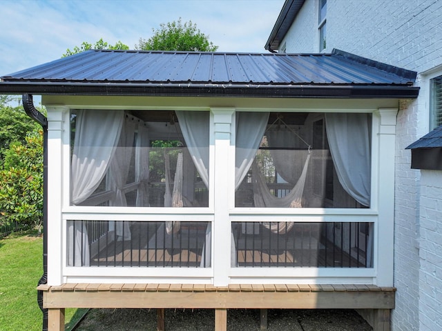 3005 Langston Pl, Spring Hill, TN 37174 - view of property exterior featuring metal roof and a sunroom