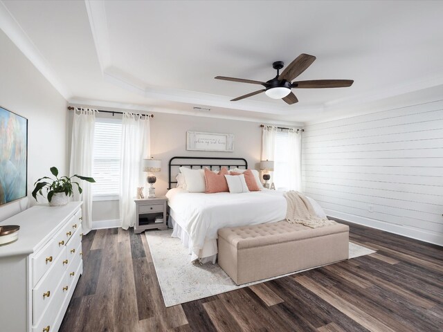 3005 Langston Pl, Spring Hill, TN 37174 - bedroom with a tray ceiling, dark wood finished floors, ceiling fan, baseboards, and crown molding