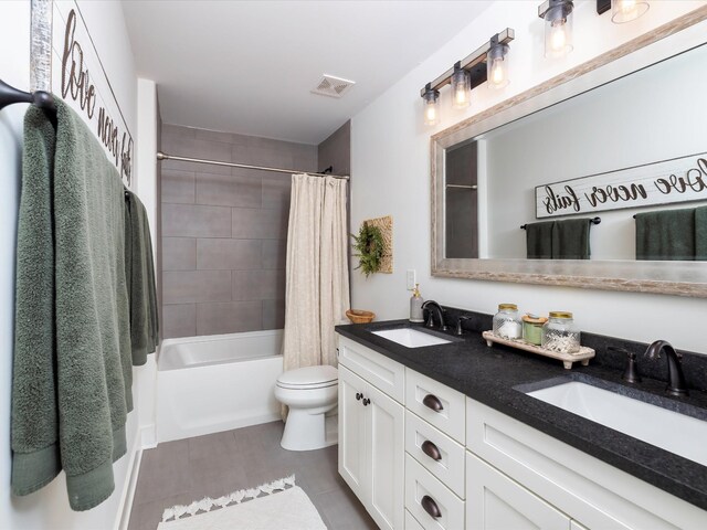 3005 Langston Pl, Spring Hill, TN 37174 - bathroom with double vanity, toilet, and shower / tub combo with curtain