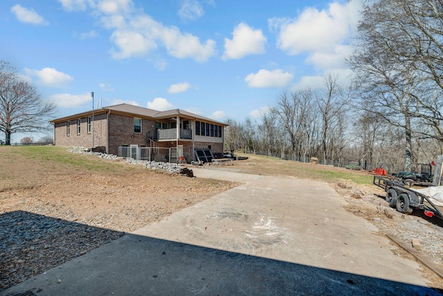 239 Henry Bayless Rd, Ardmore, TN 38449 - view of side of home featuring brick siding and a lawn