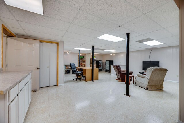239 Henry Bayless Rd, Ardmore, TN 38449 - finished below grade area featuring a desk, a paneled ceiling, and baseboards