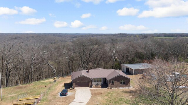 239 Henry Bayless Rd, Ardmore, TN 38449 - view from above of property featuring a heavily wooded area
