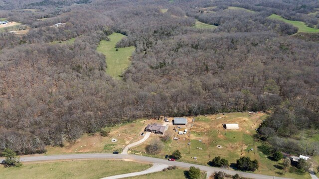 239 Henry Bayless Rd, Ardmore, TN 38449 - aerial view of property and surrounding area with a heavily wooded area