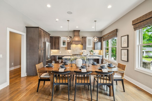 954 Russell St, Nashville, TN 37206 - dining room featuring light wood-style flooring, recessed lighting, and baseboards
