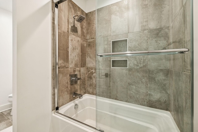 954 Russell St, Nashville, TN 37206 - bathroom with toilet and shower / bath combination with glass door