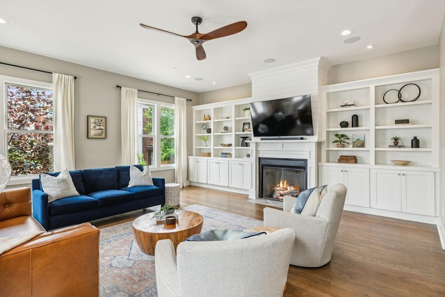 954 Russell St, Nashville, TN 37206 - living area with ceiling fan, a fireplace with flush hearth, wood finished floors, and recessed lighting