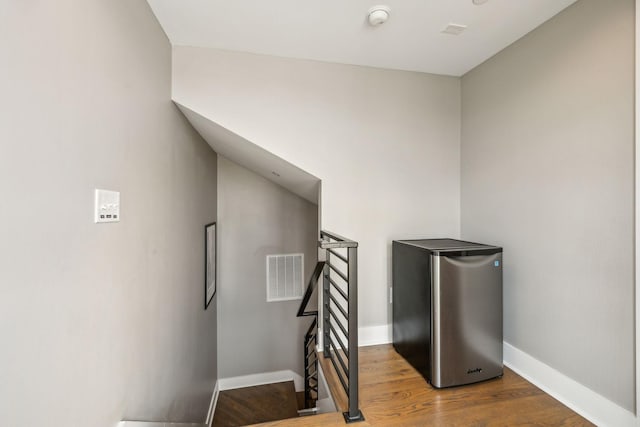 954 Russell St, Nashville, TN 37206 - stairs with wood finished floors and baseboards