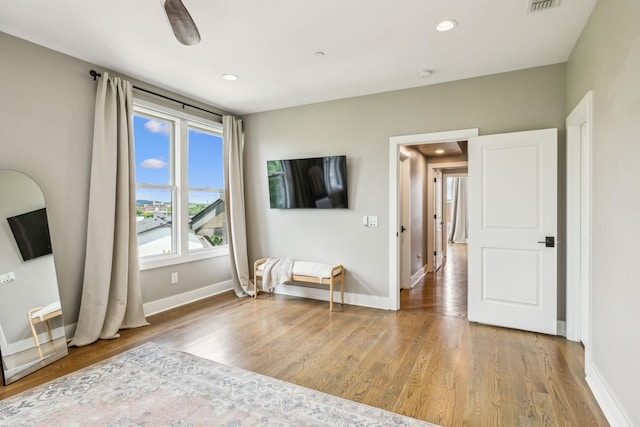 954 Russell St, Nashville, TN 37206 - unfurnished bedroom with light wood-style floors, baseboards, and recessed lighting