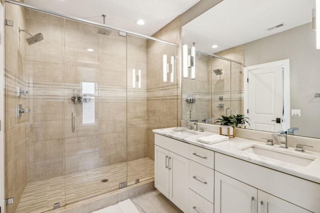 954 Russell St, Nashville, TN 37206 - full bathroom featuring double vanity, a stall shower, and recessed lighting