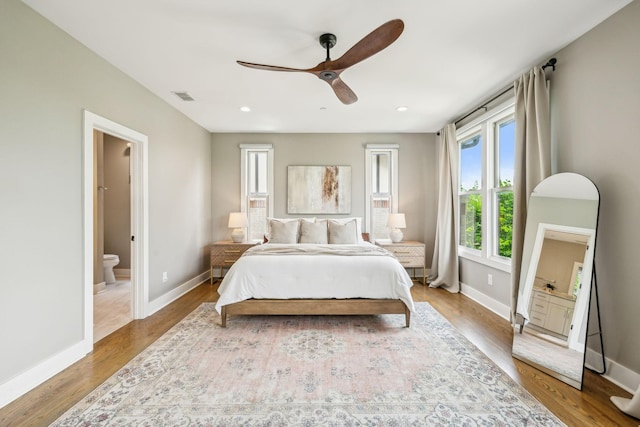 954 Russell St, Nashville, TN 37206 - bedroom featuring baseboards, ensuite bath, wood finished floors, a ceiling fan, and recessed lighting