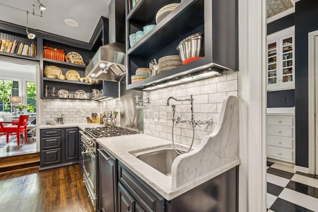 4235 Columbia Pike, Franklin, TN 37064 - kitchen with high end stainless steel range oven, open shelves, ventilation hood, light stone countertops, and tasteful backsplash
