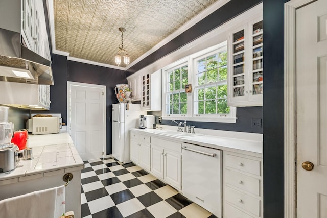 4235 Columbia Pike, Franklin, TN 37064 - kitchen with white appliances, a sink, crown molding, an ornate ceiling, and range hood