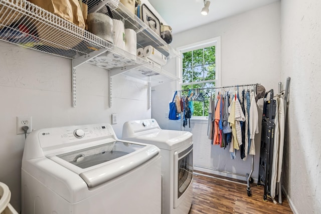 4235 Columbia Pike, Franklin, TN 37064 - laundry room with washing machine and clothes dryer and wood finished floors