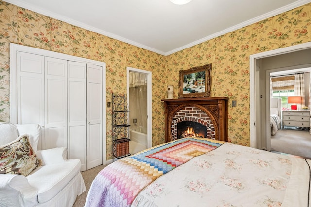 4235 Columbia Pike, Franklin, TN 37064 - carpeted bedroom featuring a closet, ornamental molding, wallpapered walls, and a brick fireplace