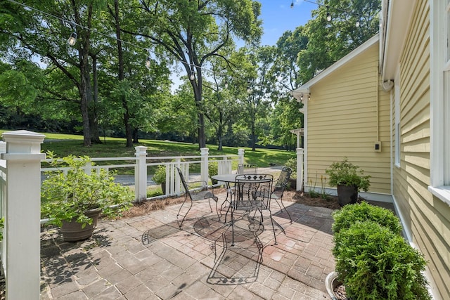 4235 Columbia Pike, Franklin, TN 37064 - view of patio featuring outdoor dining area and view of scattered trees