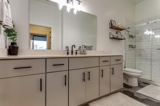 1002 Division St Unit 405, Nashville, TN 37203 - full bath featuring a stall shower, vanity, and toilet
