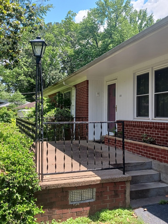 166 Westview St, Camden, TN 38320 - property entrance with brick siding
