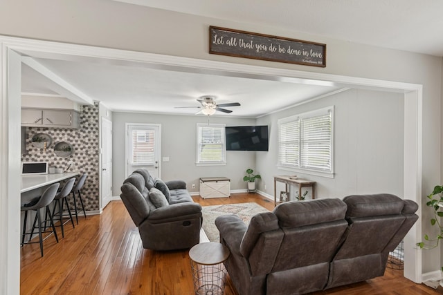 307 S Hummingbird Ln, Dickson, TN 37055 - living room featuring wood finished floors, a ceiling fan, and baseboards