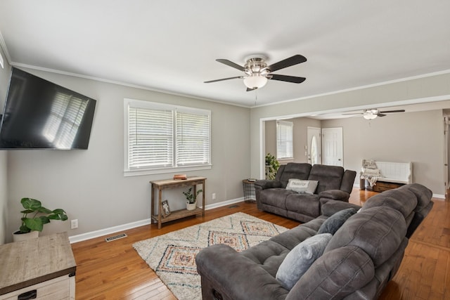 307 S Hummingbird Ln, Dickson, TN 37055 - living room featuring ceiling fan, hardwood / wood-style flooring, baseboards, and ornamental molding