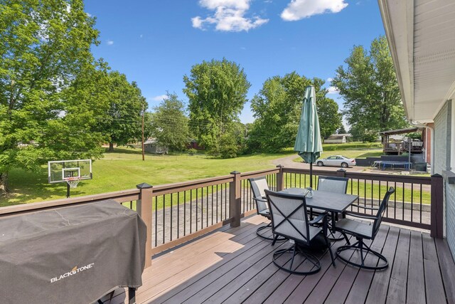 307 S Hummingbird Ln, Dickson, TN 37055 - deck featuring a lawn, outdoor dining space, and a grill