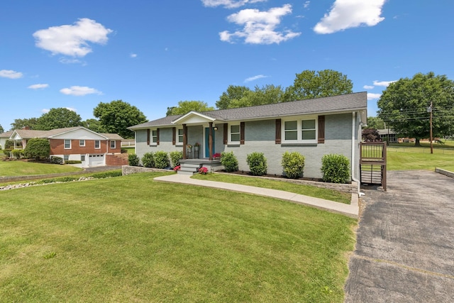 307 S Hummingbird Ln, Dickson, TN 37055 - single story home featuring a front lawn and brick siding