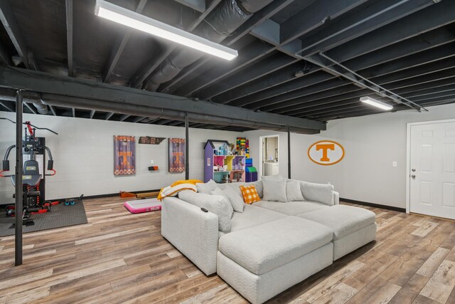 307 S Hummingbird Ln, Dickson, TN 37055 - living area with wood finished floors and baseboards