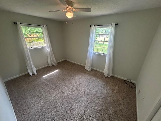 203 Arnold Ave, Tullahoma, TN 37388 - carpeted empty room with healthy amount of natural light, ceiling fan, and baseboards