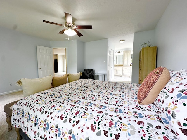 512 Riverview Dr, Franklin, TN 37064 - carpeted bedroom with baseboards, connected bathroom, and ceiling fan