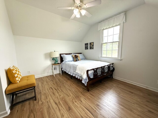 512 Riverview Dr, Franklin, TN 37064 - bedroom with wood finished floors, vaulted ceiling, baseboards, and a ceiling fan