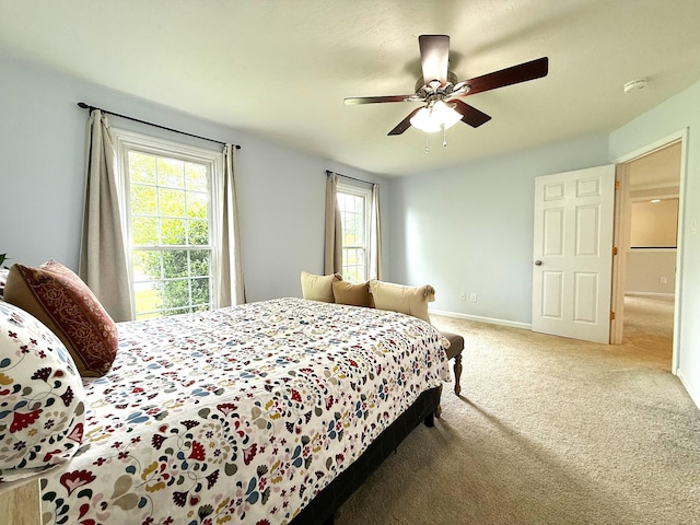 512 Riverview Dr, Franklin, TN 37064 - carpeted bedroom featuring multiple windows, a ceiling fan, and baseboards