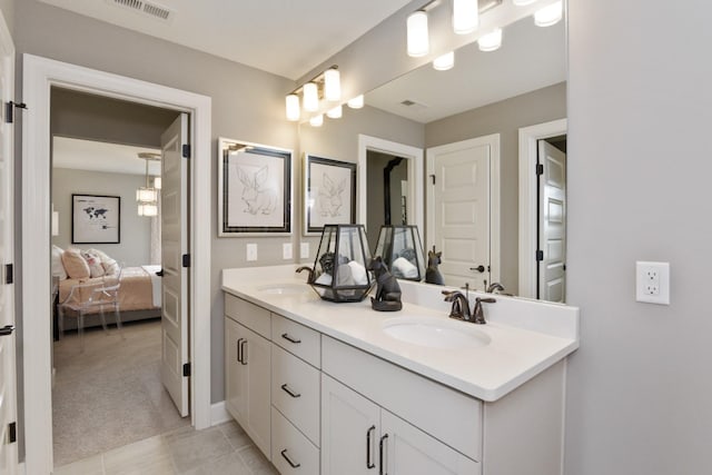 215 S Dunnwood Ln, Mount Juliet, TN 37122 - ensuite bathroom with double vanity and tile patterned flooring