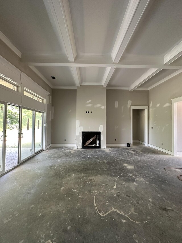 887 Ovoca Lake Rd, Tullahoma, TN 37388 - unfurnished living room with coffered ceiling, baseboards, beamed ceiling, and a fireplace