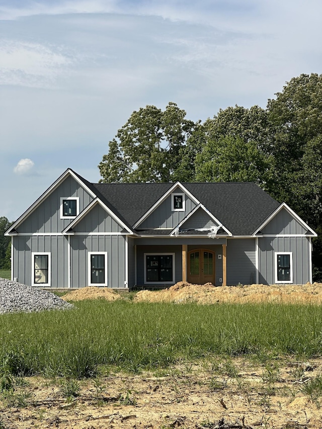 887 Ovoca Lake Rd, Tullahoma, TN 37388 - view of front of property with board and batten siding and a shingled roof
