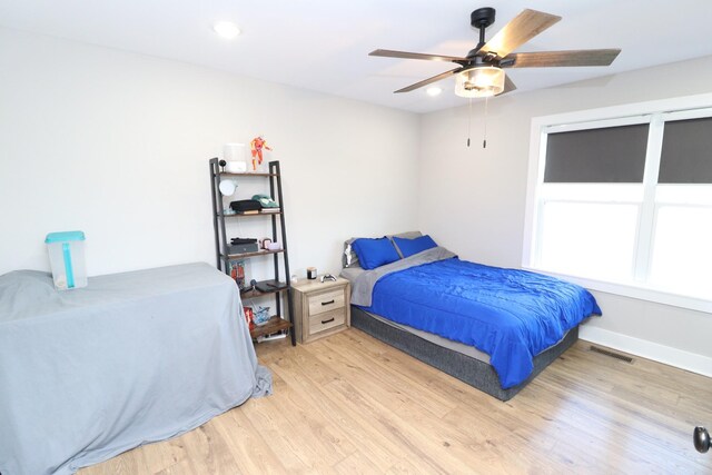 214 Miller Rd, Lafayette, TN 37083 - bedroom with light wood finished floors, a ceiling fan, and recessed lighting