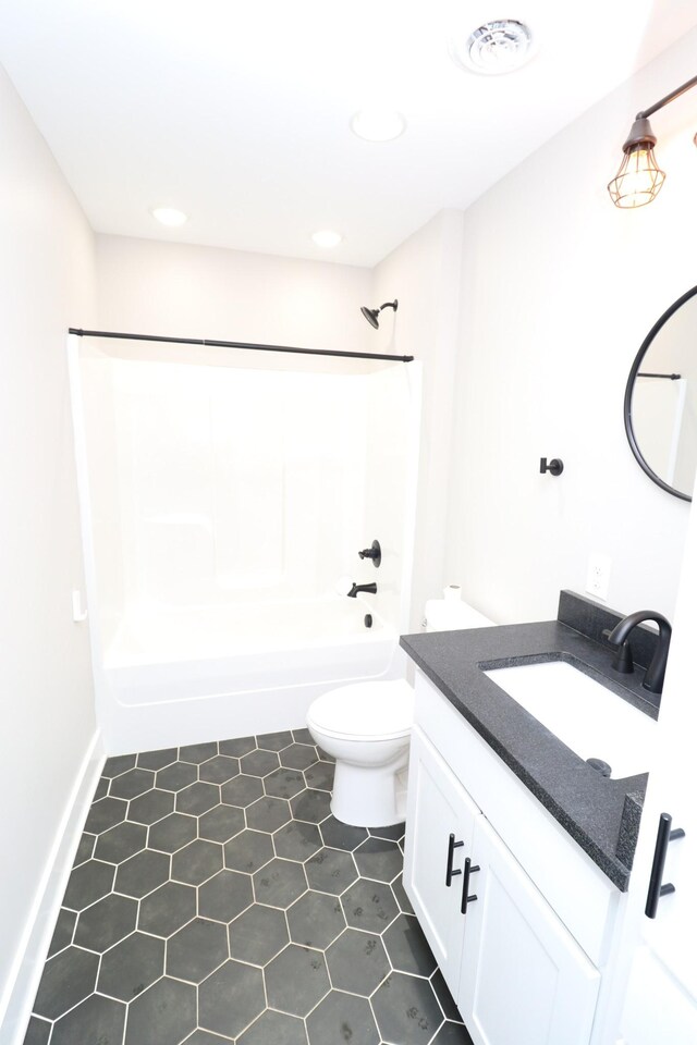 214 Miller Rd, Lafayette, TN 37083 - full bathroom with vanity, tub / shower combination, toilet, tile patterned floors, and recessed lighting