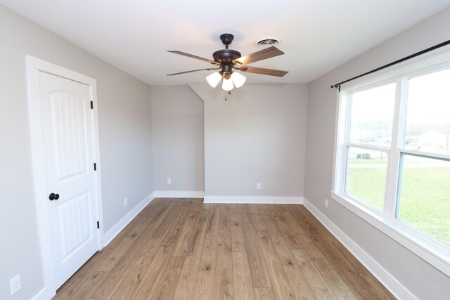 214 Miller Rd, Lafayette, TN 37083 - empty room featuring ceiling fan, light wood-style flooring, and baseboards