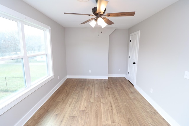 214 Miller Rd, Lafayette, TN 37083 - unfurnished room with light wood-style floors, a ceiling fan, and baseboards