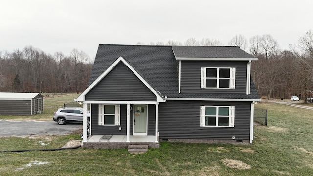 214 Miller Rd, Lafayette, TN 37083 - view of front of property featuring covered porch, a shingled roof, and a front lawn