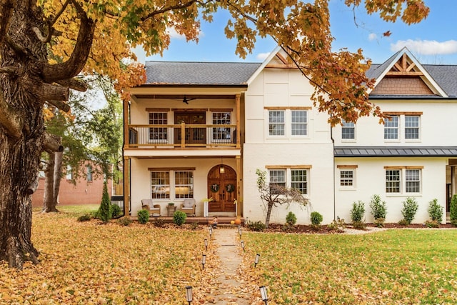 103 Maple St, Smyrna, TN 37167 - view of front of property with a balcony, covered porch, a front yard, a standing seam roof, and roof with shingles