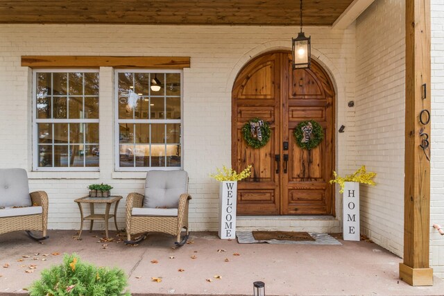 103 Maple St, Smyrna, TN 37167 - view of exterior entry featuring brick siding and covered porch