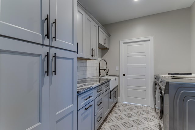 103 Maple St, Smyrna, TN 37167 - washroom with washer and clothes dryer and cabinet space