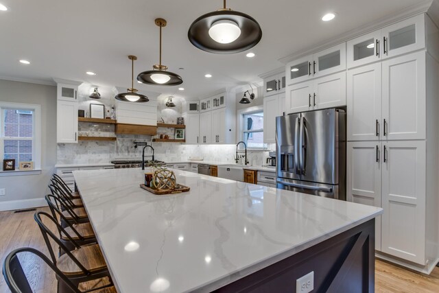 103 Maple St, Smyrna, TN 37167 - kitchen with stainless steel refrigerator with ice dispenser, open shelves, a sink, white cabinetry, and recessed lighting