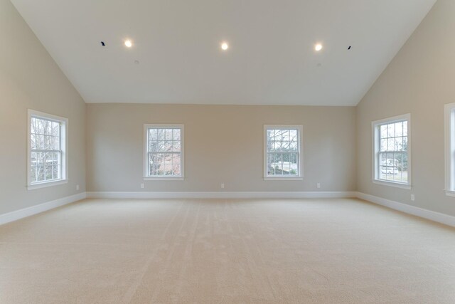 103 Maple St, Smyrna, TN 37167 - spare room featuring high vaulted ceiling, light carpet, baseboards, and recessed lighting