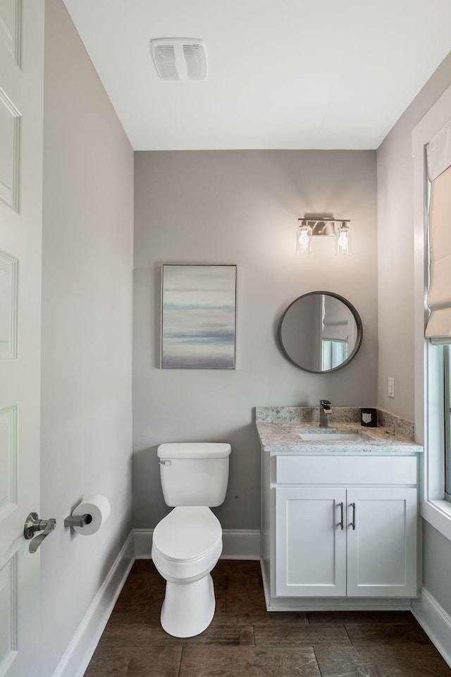 5124 Southfork Blvd, Old Hickory, TN 37138 - bathroom featuring baseboards, toilet, vanity, and wood finished floors