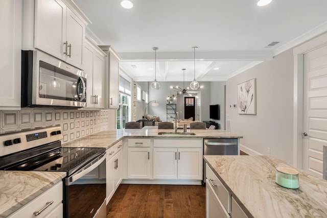 5124 Southfork Blvd, Old Hickory, TN 37138 - kitchen with appliances with stainless steel finishes, a sink, dark wood-style floors, open floor plan, and beamed ceiling