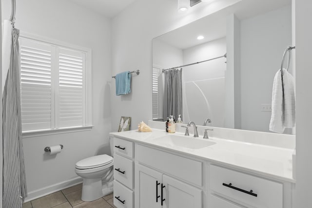 7428 Dodd Retreat Ct, Hermitage, TN 37076 - bathroom featuring vanity, toilet, curtained shower, tile patterned flooring, and baseboards