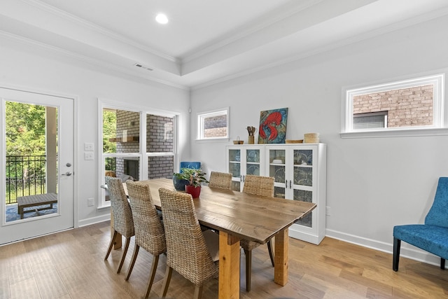 7428 Dodd Retreat Ct, Hermitage, TN 37076 - dining space with ornamental molding, wood finished floors, a tray ceiling, recessed lighting, and baseboards
